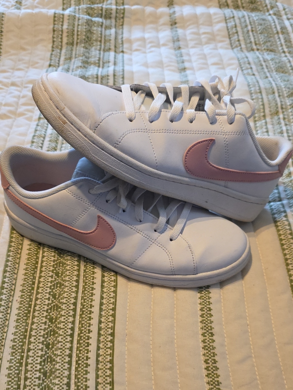 Nike Women's White Leather Sneakers with Pink Swoosh Accent